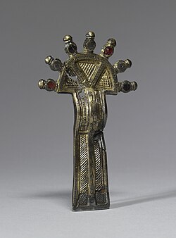 A 6th century bow fibula found in north-eastern France and the Rhineland. They were worn by Frankish noblewomen in pairs at the shoulder or as belt ornaments.