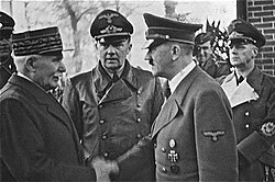 Philippe Pétain (left) meeting with Hitler in October 1940