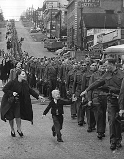 Wait for Me, Daddy, a photo taken by Claude P. Dettloff of the British Columbia Regiment marching in New Westminster, October 1940