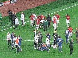 The players prepare for the penalty shoot-out.