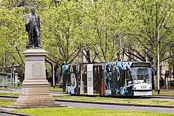 A D-class tram on St Kilda Road. The city's tram network consists of 493 trams and is the largest in the world.