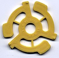 Columbia and RCA Victor's competition extended to equipment. Some turntables included spindle size adapters, but other turntables required snap-in inserts like this one to adapt Victor's larger 45 rpm spindle size to the smaller spindle size available on nearly all turntables.[61] Shown is one popular design in use for many years.