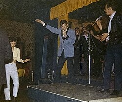 Shakin' Stevens wearing electric blue drape jacket, 1970s
