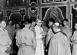 Members of the Canadian Army's Royal 22nd Regiment in audience with Pope Pius XII on 4 July 1944, following the Battle of Anzio, which liberated Rome from Nazi German and the Italian fascist occupation during World War II.