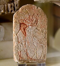 Painted limestone miniature stela. It shows Akhenaten standing before two incense stands, Aten disc above. From Amarna, Egypt – 18th Dynasty. Petrie Museum, London