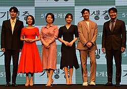 The cast of Parasite, the first Korean film to win the Palme d'Or and Academy Award for Best Picture