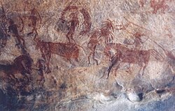Bhimbetka rock painting showing a man riding on a horse, India