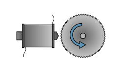 The tonewheel rotates beside an electromagnetic pickup.