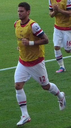 Giroud warming up for Arsenal in 2012