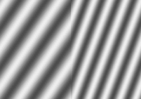 Sinusoidal traveling plane wave entering a region of lower wave velocity at an angle, illustrating the decrease in wavelength and change of direction (refraction) that results