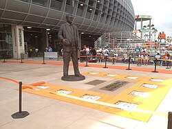 A statue of the original founder/owner of the Miami Dolphins from 1966 to 1989, Joe Robbie, on display as the centerpiece to the Joe Robbie Alumni Plaza Walk of Fame.