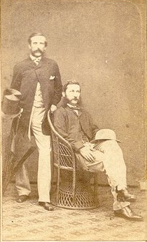 Thomas Bradley Harris (standing left) and Torrey (sitting right).