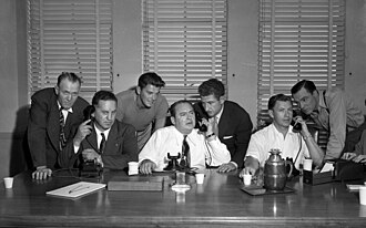 Seven actors and studio workers during a telephone conference held in the aftermath of Hollywood Black Friday in which American Federation of Labor officials denied issuing a "clarification" which set off the film strike, October 26, 1946.(L-R): James Skelton, Herbert Sorrell, Ronald Reagan, Edward Arnold, Roy Tindall, George Murphy, and Gene Kelly.