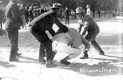 Members of the right-wing Lapua Movement assault a former Red Guard officer and the publisher of the communist newspaper at the Vaasa riot on June 4, 1930, in Vaasa, Finland.