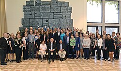 Delegation of Jewish Federations of North America in Beit HaNassi, Israel. In the background is an Israeli volcanic ash artwork.