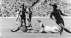 Capello (No.8) is brought down v. Haiti