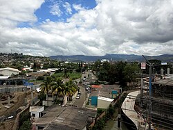 Looking northeast from Comayagüela at the construction site of the upcoming shopping mall City Mall