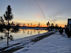 Snow with a sunset in Milton, Florida on January 22.