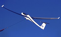 A glider (sailplane) being winch-launched