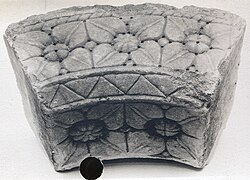 A single voussoir unit, made of marble, 6 5/8 x 14 1/2 in. (16.8 x 36.8 cm) 1130–40.