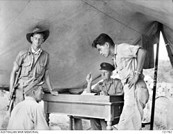 Sergeant Hosotani Naoji of the Kempeitai unit at Sandakan (North Borneo), is interrogated on 26 October 1945, by Squadron Leader F.G. Birchall of the Royal Australian Air Force, and Sergeant Mamo (a Nisei interpreter). Naoji confessed to shooting two Australian POWs and five ethnic Chinese civilians.