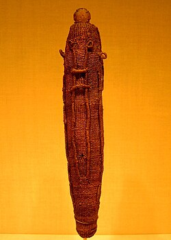 A sacred god figure wrapping for the war god 'Oro, made of woven dried coconut fibre (sennit), made to protect a Polynesian god effigy (to'o), carved from wood