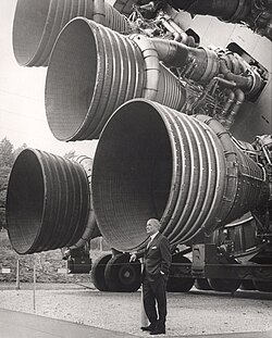 Wernher von Braun, with the F-1 engines of the Saturn V first stage at the US Space and Rocket Center