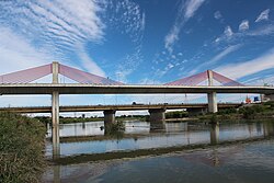 A concrete bridge over a river