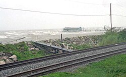 Lake Pontchartrain at New Orleans during Hurricane Georges in 1998; lakefront fishing camps outside of the protection levee suffered severe damage.