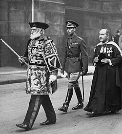 Sir Francis Grant was Lord Lyon from 1929 to 1945. Grant (left), and the Duke of York (centre) proceeding to St Giles' Cathedral in 1933.