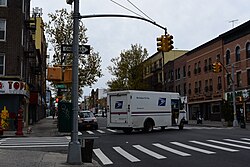 Truck delivering mail in April 2020 during the COVID-19 Pandemic in Bay Ridge, Brooklyn, New York