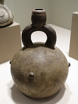 Stirrup-spout vessel with four bosses from the Cupisnique culture, Peru.