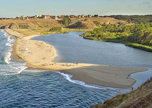 The estuary of the Veleka in the Black Sea. Longshore drift has deposited sediment along the shoreline which has led to the formation of a spit (Sinemorets, Bulgaria).