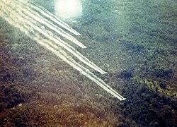 An Agent Orange spray run by aircraft, part of Operation Ranch Hand in the Vietnam War