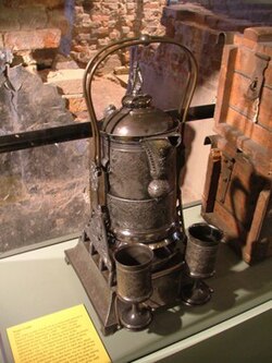A water cooler given as a gift to the head of the coining department at the New Orleans Mint in 1891 by his staff