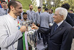 President of Italy Sergio Mattarella (right) congratulates captain Chiellini in Rome, the day after Italy's triumph at UEFA Euro 2020