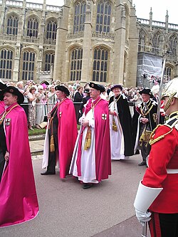 Officers of the Order of the Garter (left to right): Secretary (barely visible), Black Rod, Garter Principal King of Arms, Register, Prelate, Chancellor