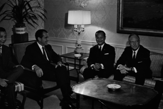 President Richard Nixon (left) and Secretary of State William P. Rogers (right) meet with South Vietnamese Foreign Minister Trần Văn Lắm at the Waldorf Astoria, September 18, 1969