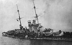 The sinking of SMS Szent István, after being torpedoed by Italian motor boats