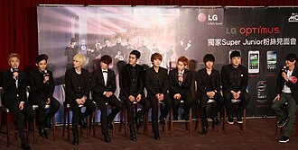 Super Junior members at LG Optimus Super Junior Fan meeting at Chateau de Chine in Kaohsiung, Taiwan in November 2011. (L-R: Leeteuk, Ryeowook, Eunhyuk, Donghae, Siwon, Kyuhyun, Sungmin, Yesung, Shindong)