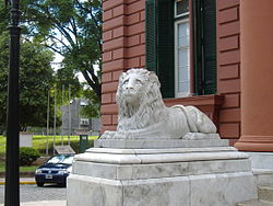 A close-up of the left-side lion