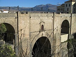 The Puente Nuevo bridge, Ronda. Both Nationalists and Republicans are claimed to have thrown prisoners from the bridge to their deaths in the canyon.[428]
