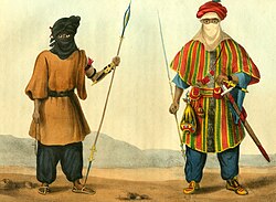 Armed Tuareg men depicted in a French book of 1821. Both men carry spears and the telek dagger attached to the left forearm, the man on the right (a noble) is also armed with the takouba sword.