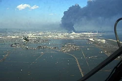 An aerial view of the smoke from the Sendai Nippon Oil refinery