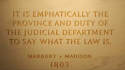 Inscription on the wall of the Supreme Court Building from Marbury v. Madison, in which Chief Justice John Marshall outlined the concept of judicial review