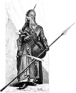 An Egyptian Mamluk warrior in full armor and armed with lance, shield, Mameluke sword, yatagan and pistols.