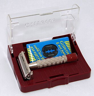 A 1958 Gillette Super Speed razor and a blade dispenser