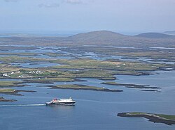 Caledonian MacBrayne ferry MV Hebrides leaving Lochmaddy, North Uist, en route for Skye