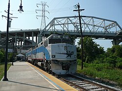 A WeGo Star commuter train beneath the Shelby Street Bridge