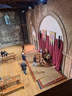The recreated banquet hall with a throne in 2025